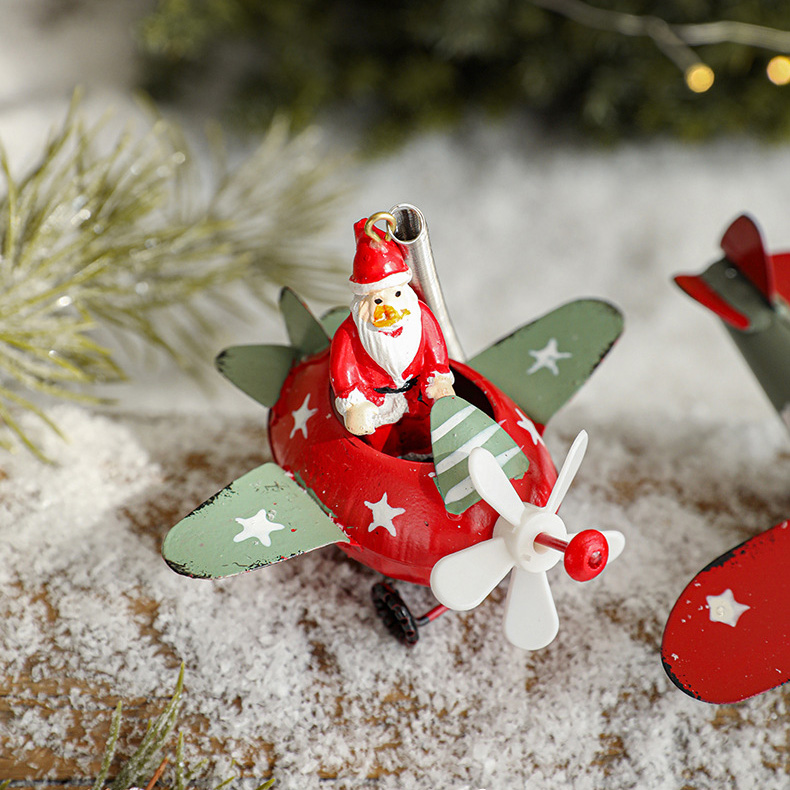 Novogodisnji ukras za jelku deda mraz u avionu EL crveni
